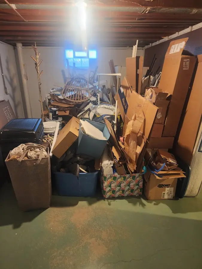 Roll-off dumpster container at job site for Construction Dumpster Rental in Lutz